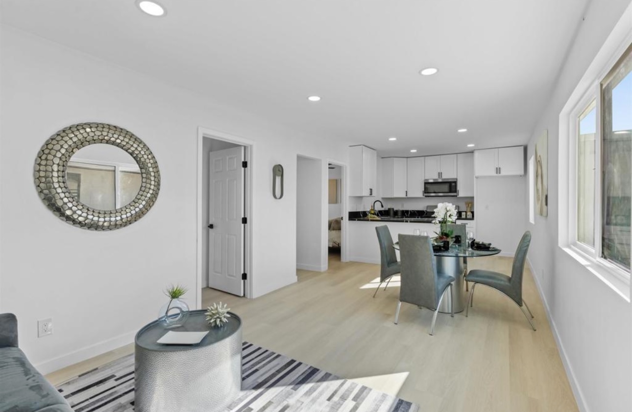 Bright open-plan ADU interior with living, dining, and kitchen — Lieon Housing custom ADU build